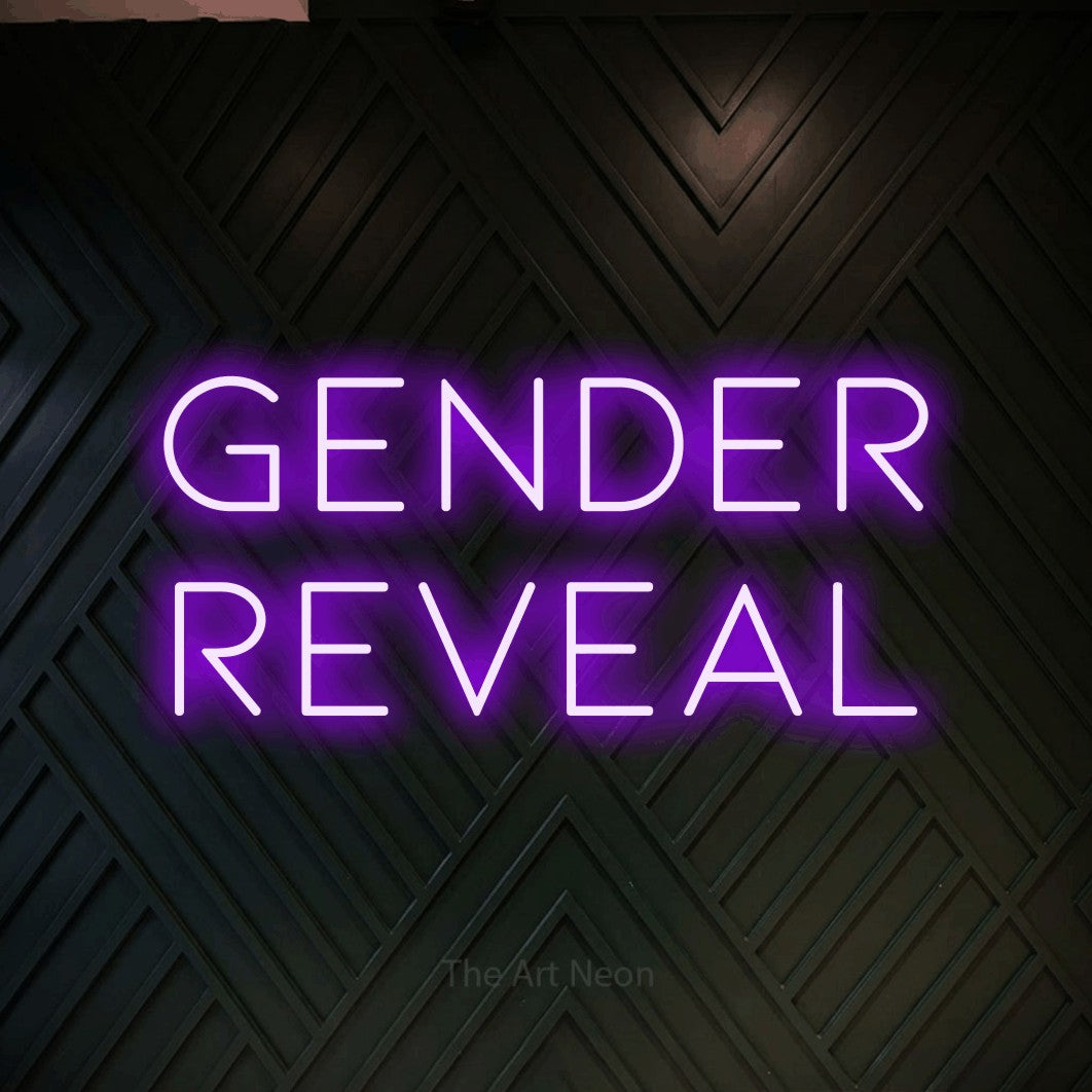 Purple LED neon sign reading "Gender Reveal" against a dark geometric wood wall