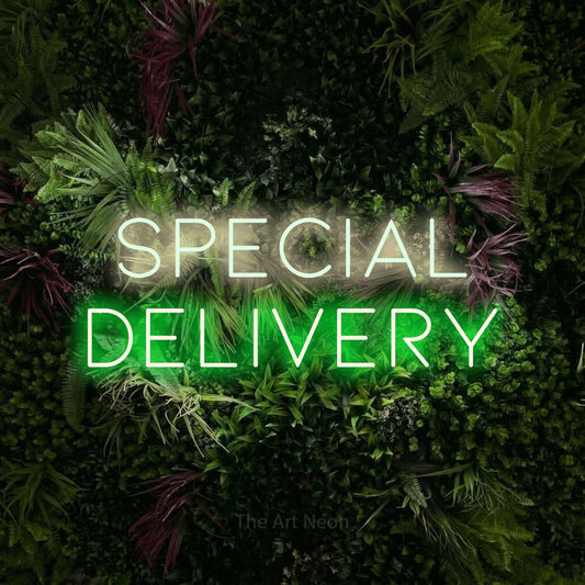 Green and warm white LED neon sign reading "Special Delivery" against a lush garden wall with pink flowers