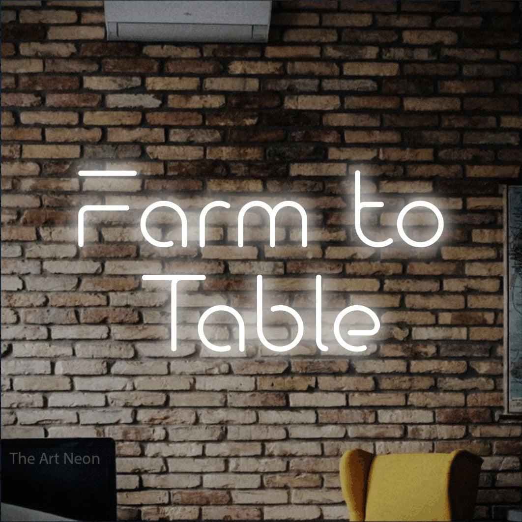Cool white LED neon sign reading "Farm to Table" against a rustic brick wall for restaurant décor