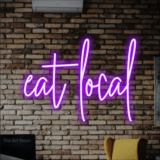 Purple script-style LED neon sign reading "Eat Local" against a rustic brick wall for restaurant décor