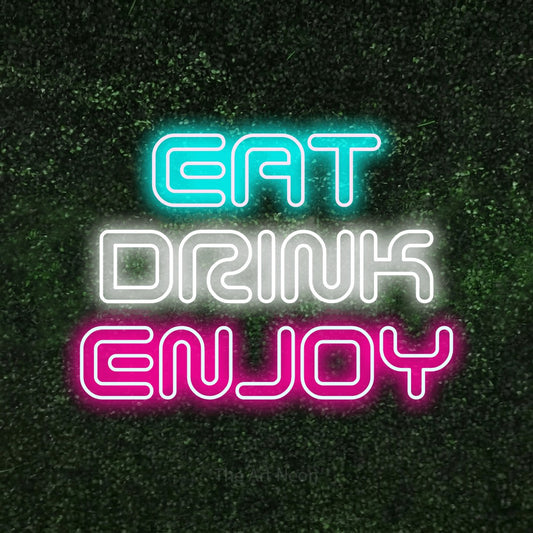 Multicolour outline-style LED neon sign reading "Eat Drink Enjoy" against a textured green moss wall for restaurant décor
