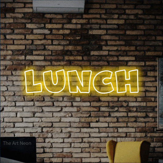 Yellow outline-style LED neon sign reading "Lunch" against a rustic brick wall for restaurant décor