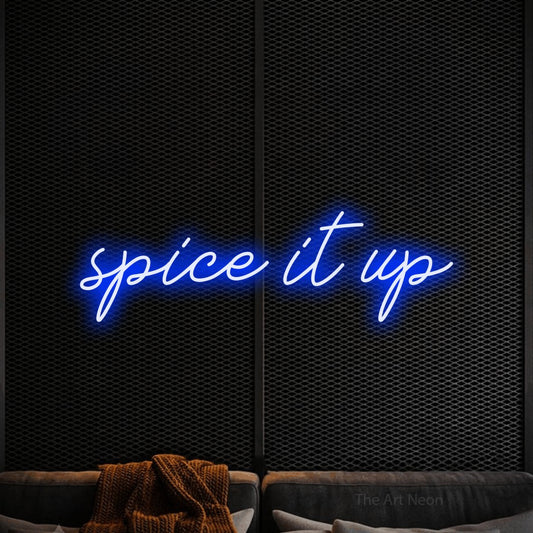 Blue script-style LED neon sign reading "Spice It Up" against a black textured wall for restaurant décor