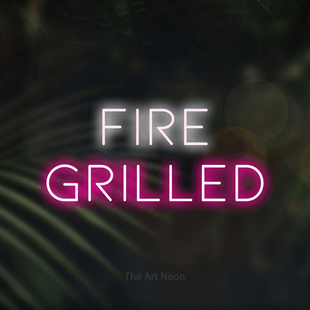 Hot pink and cool white LED neon sign reading "Fire Grilled" against dark blurred palm leaves for restaurant décor
