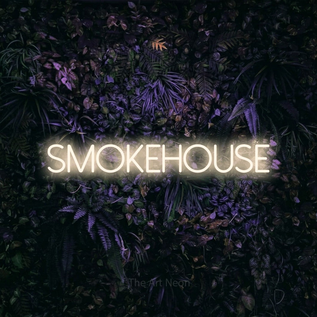 Warm white LED neon sign reading "Smokehouse" against a purple floral wall for restaurant décor
