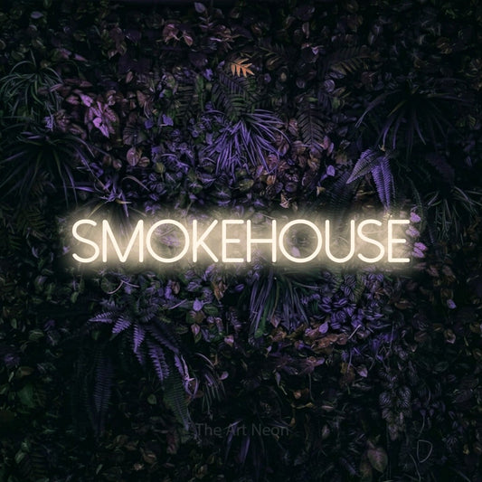 Warm white LED neon sign reading "Smokehouse" against a purple floral wall for restaurant décor