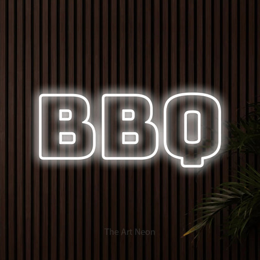 Cool white outline-style LED neon sign reading "BBQ" against dark wooden slats for restaurant décor