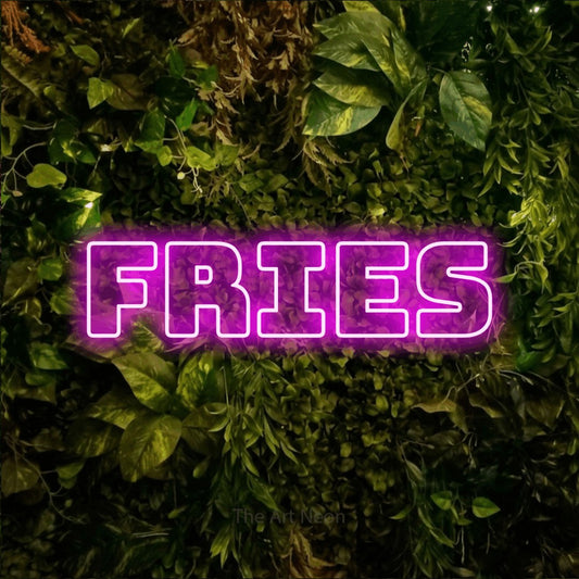 Pink outline-style LED neon sign reading "Fries" against a textured moss and foliage wall for restaurant décor