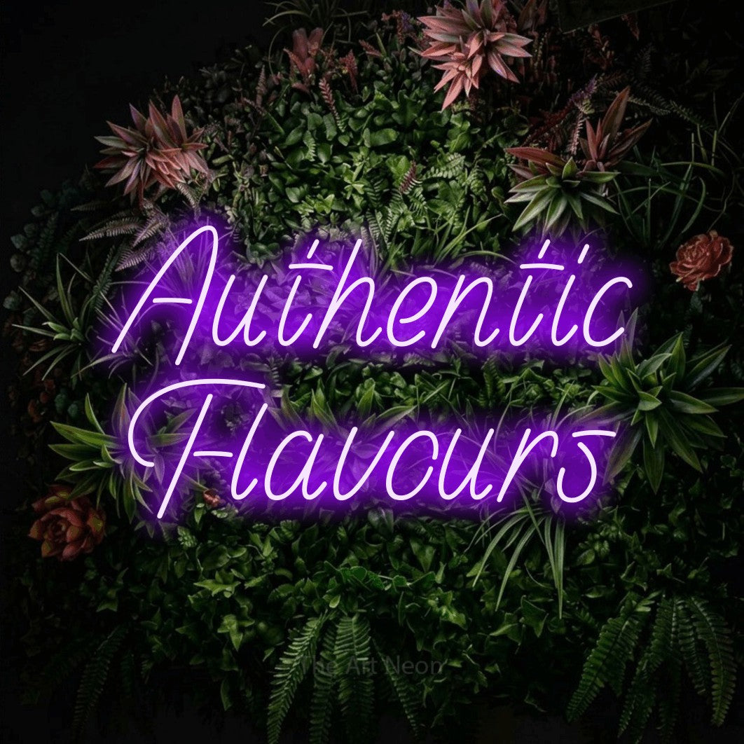 Purple LED neon sign reading "Authentic Flavours" against a flowering garden wall for restaurant décor