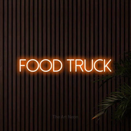 Orange LED neon sign reading "Food Truck" against dark wooden slats for restaurant décor