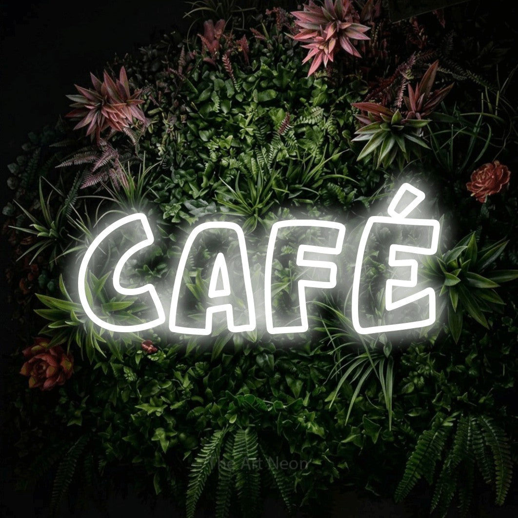 Cool white outline-style LED neon sign reading "Café" against a flowering garden wall for café décor