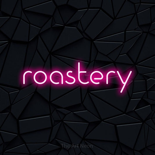 Hot pink LED neon sign reading "Roastery" against a black faceted wall for café décor