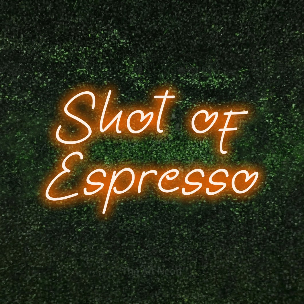 Orange LED neon sign reading "Shot of Espresso" against a textured green moss wall for café décor