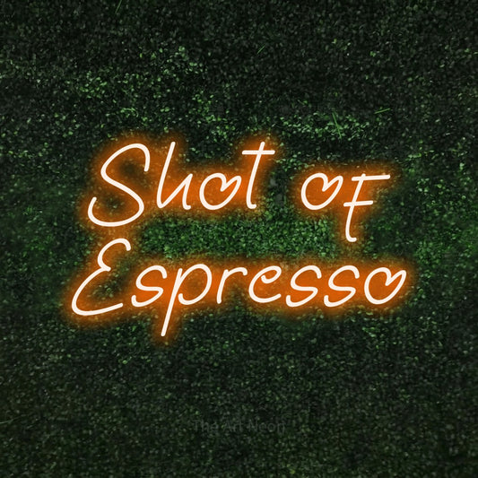 Orange LED neon sign reading "Shot of Espresso" against a textured green moss wall for café décor