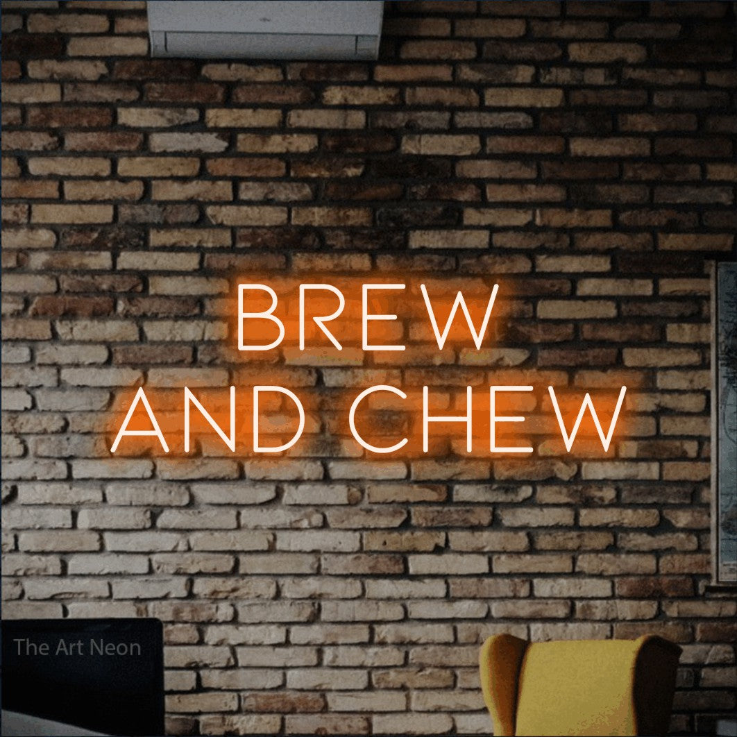Orange LED neon sign reading "Brew and Chew" against a rustic brick wall for café décor
