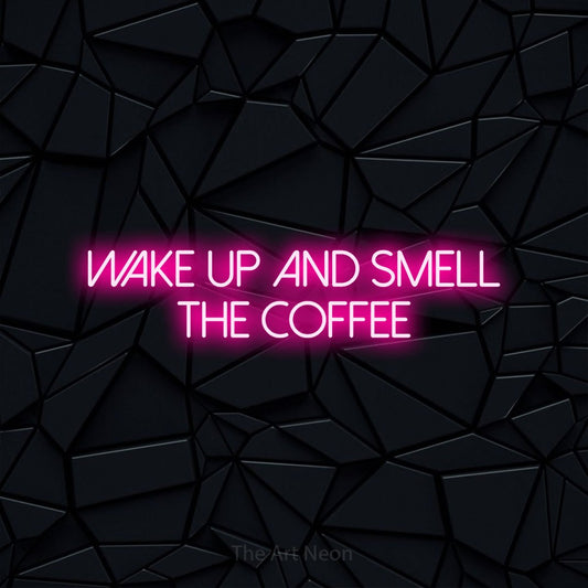 Hot pink LED neon sign reading "Wake Up and Smell the Coffee" against a black faceted wall for café décor