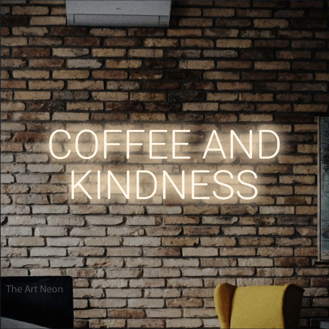 Warm white LED neon sign reading "Coffee and Kindness" against a rustic brick wall for café décor