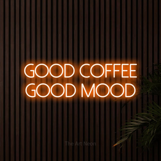 Orange LED neon sign reading "Good Coffee Good Mood" against dark wooden slats for café décor