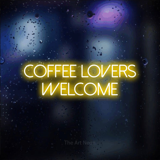 Yellow LED neon sign reading "Coffee Lovers Welcome" against a dark blue bokeh background for café décor