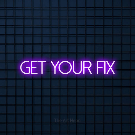 Purple LED neon sign reading "Get Your Fix" against a dark blue tiled wall for café décor