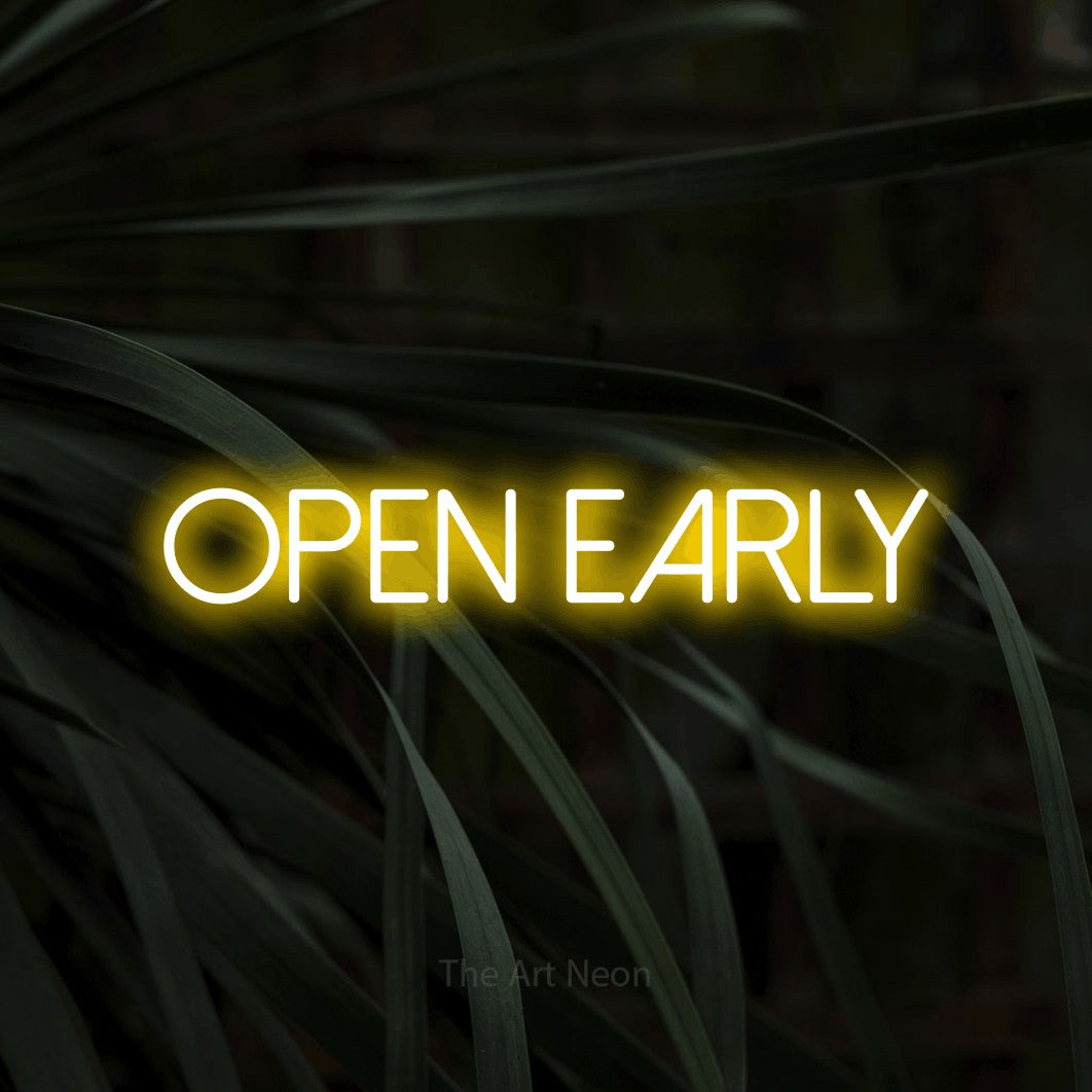 Yellow LED neon sign reading "Open Early" against dark tropical leaves for café décor