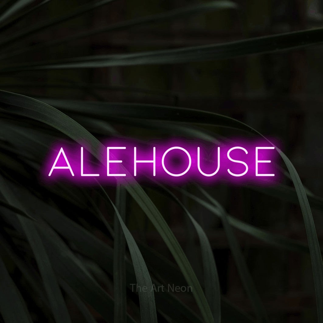 Pink LED neon sign reading "Alehouse" against dark tropical leaves for bar décor