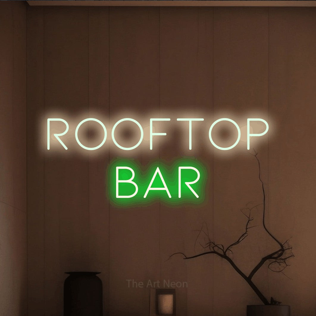 Green and warm white LED neon sign reading "Rooftop Bar" against a warm brown wall for bar décor