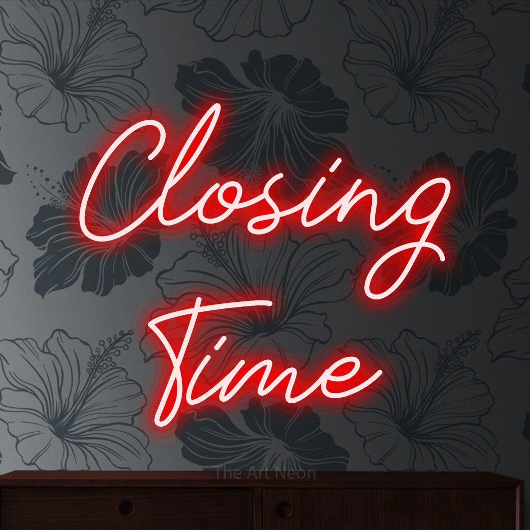 Red script-style LED neon sign reading "Closing Time" against grey floral wallpaper for bar décor