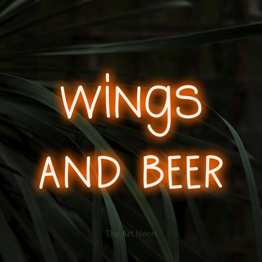 Orange LED neon sign reading "Wings and Beer" against dark tropical leaves for bar décor