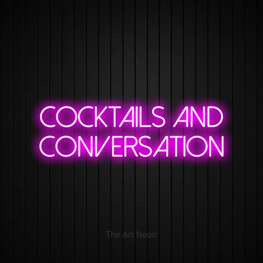 Pink LED neon sign reading "Cocktails and Conversation" against a black vertical slat wall for bar décor