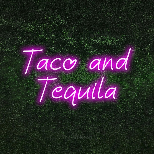 Pink LED neon sign reading "Taco and Tequila" against a textured green moss wall for bar décor