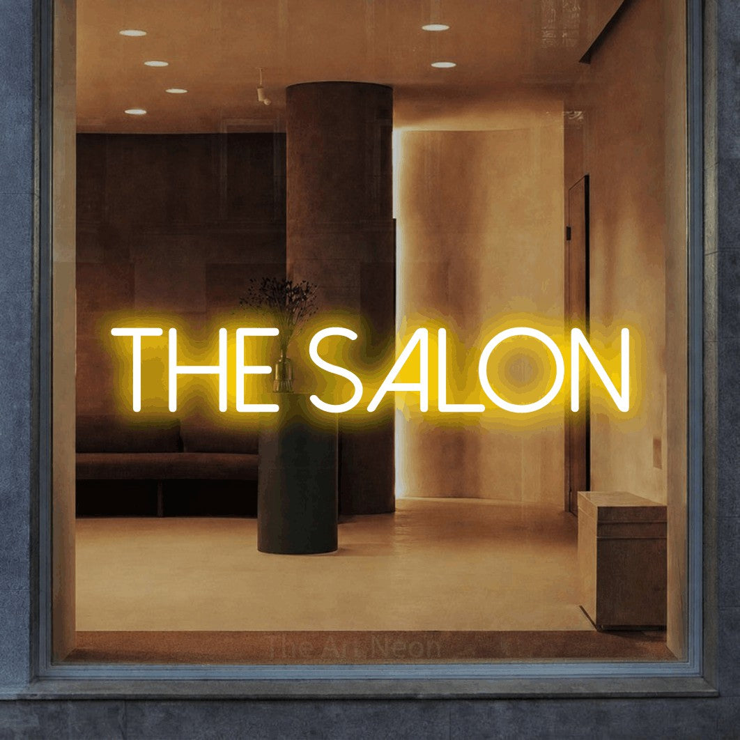 Yellow LED neon sign reading "The Salon" in a warm modern interior for salon décor