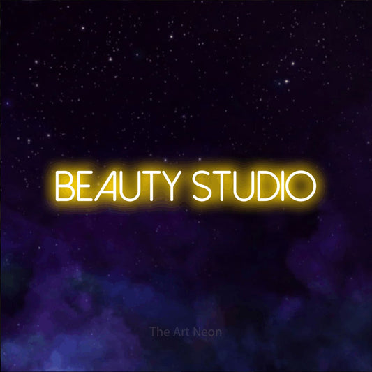 Yellow LED neon sign reading "Beauty Studio" against a purple galaxy background for salon décor