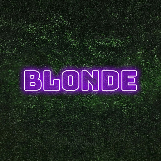 Purple outline-style LED neon sign reading "Blonde" against a textured green moss wall for salon décor