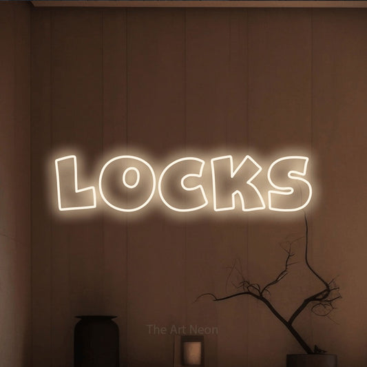 Warm white outline-style LED neon sign reading "Locks" against a warm brown wall for salon décor