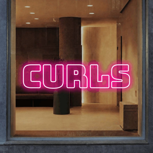 Hot pink outline-style LED neon sign reading "Curls" in a warm modern interior for salon décor