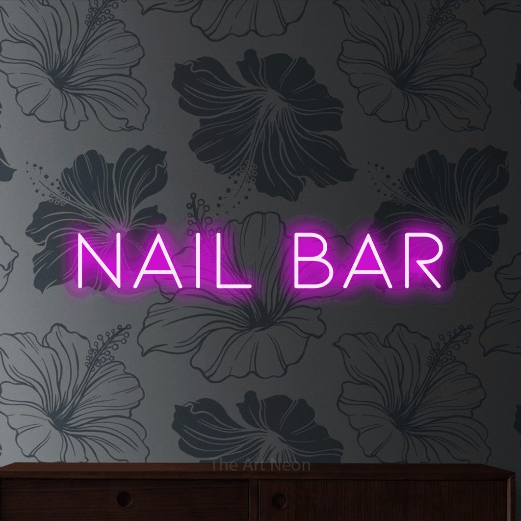 Pink LED neon sign reading "Nail Bar" against grey floral wallpaper for salon décor
