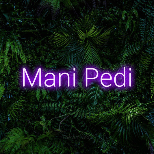 Purple LED neon sign reading "Mani Pedi" against a dense tropical foliage wall for salon décor