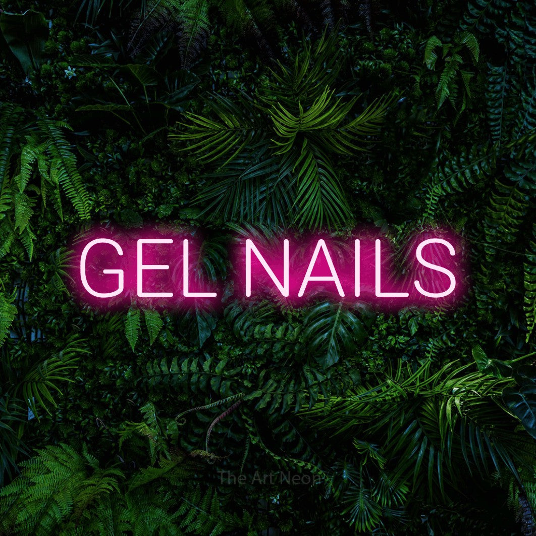 Hot pink LED neon sign reading "Gel Nails" against a dense tropical foliage wall for salon décor
