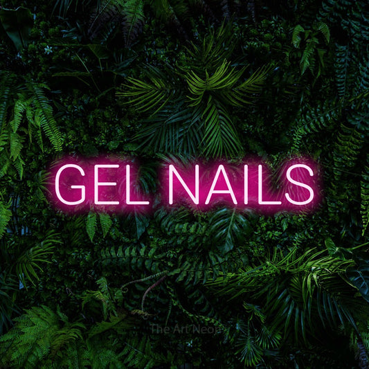 Hot pink LED neon sign reading "Gel Nails" against a dense tropical foliage wall for salon décor