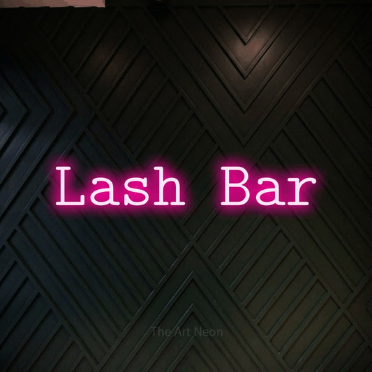 Hot pink LED neon sign reading "Lash Bar" against a dark geometric wood wall for salon décor