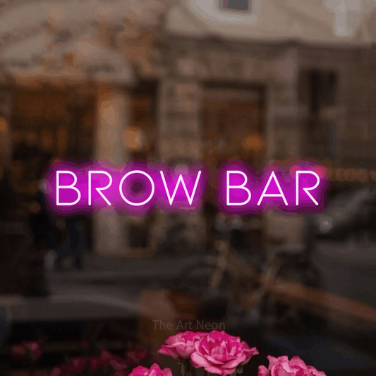 Pink LED neon sign reading "Brow Bar" in a softly blurred café interior for salon décor