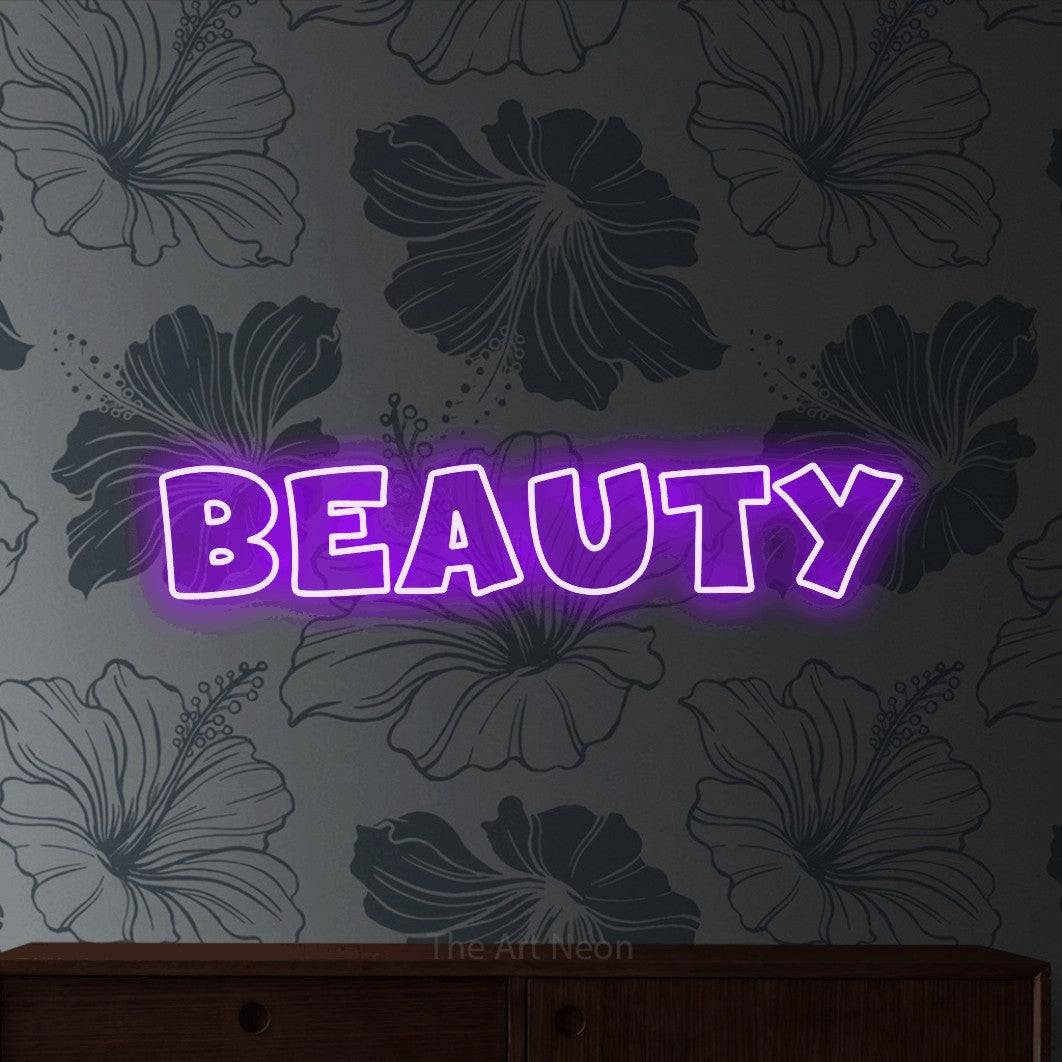 Purple outline-style LED neon sign reading "Beauty" against grey floral wallpaper for salon décor