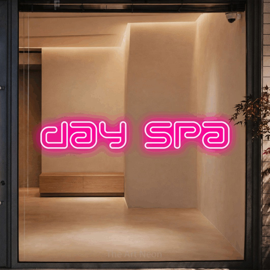 Hot pink outline-style LED neon sign reading "Day Spa" against a warm beige alcove wall for salon décor