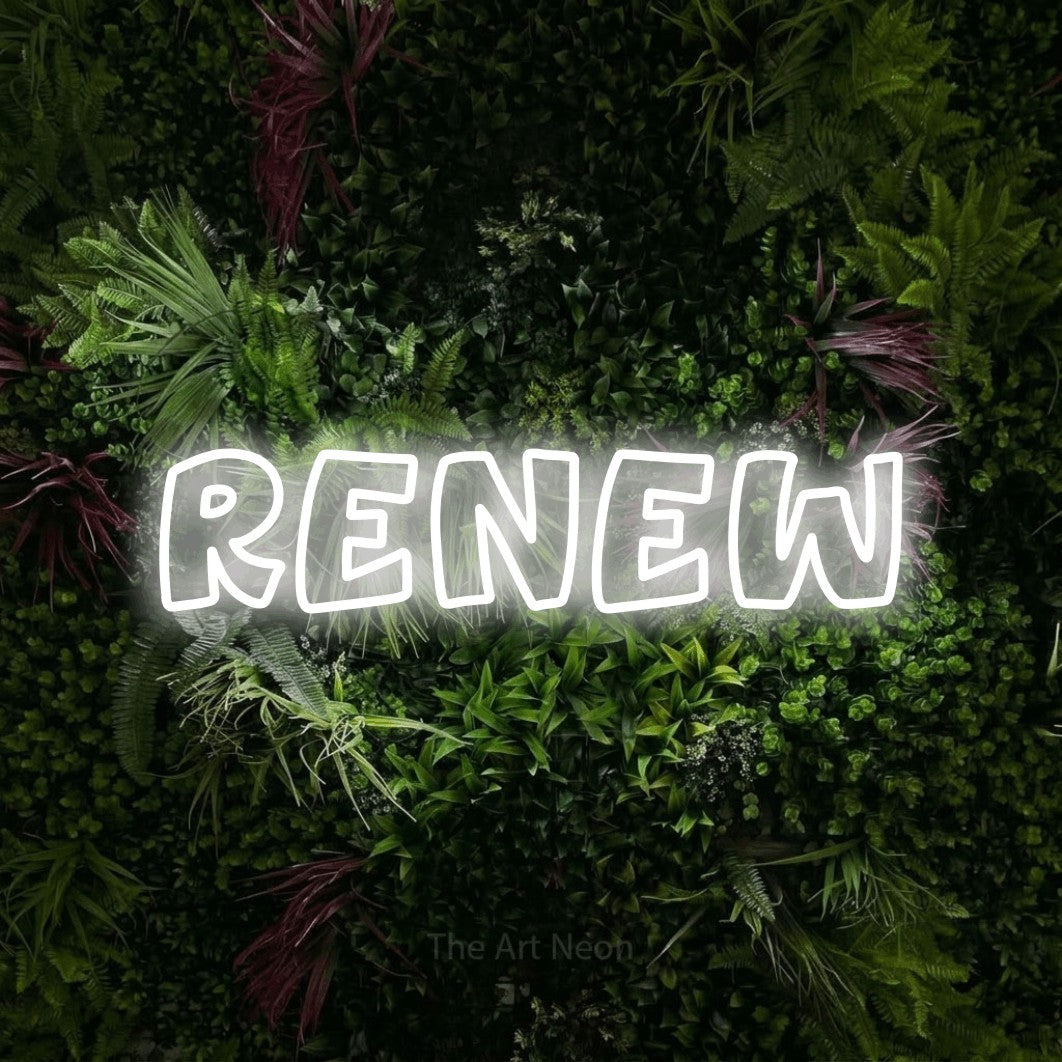 Cool white outline-style LED neon sign reading "Renew" against a lush garden wall with pink flowers for salon décor