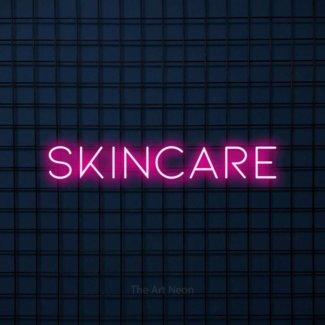 Hot pink LED neon sign reading "Skincare" against a dark blue tiled wall for salon décor