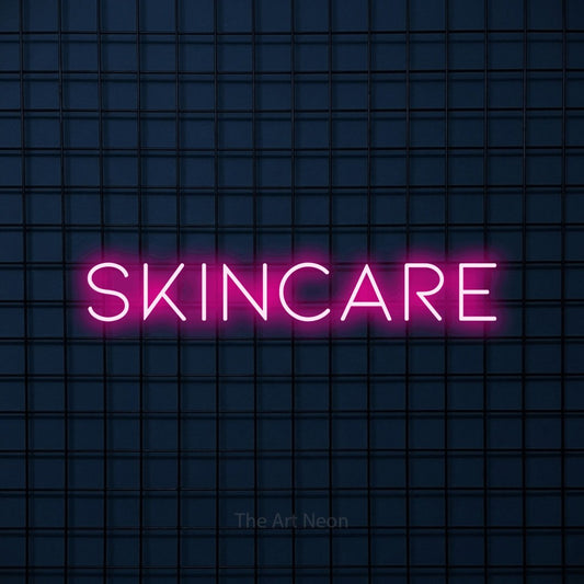 Hot pink LED neon sign reading "Skincare" against a dark blue tiled wall for salon décor