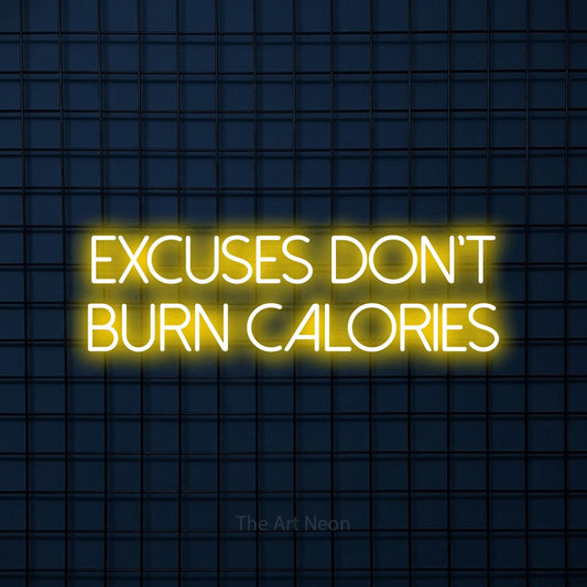 Yellow LED neon sign reading "Excuses Don't Burn Calories" against a dark blue tiled wall for gym décor
