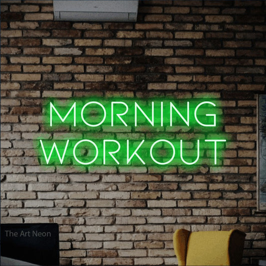 Green LED neon sign reading "Morning Workout" against a rustic brick wall for gym décor