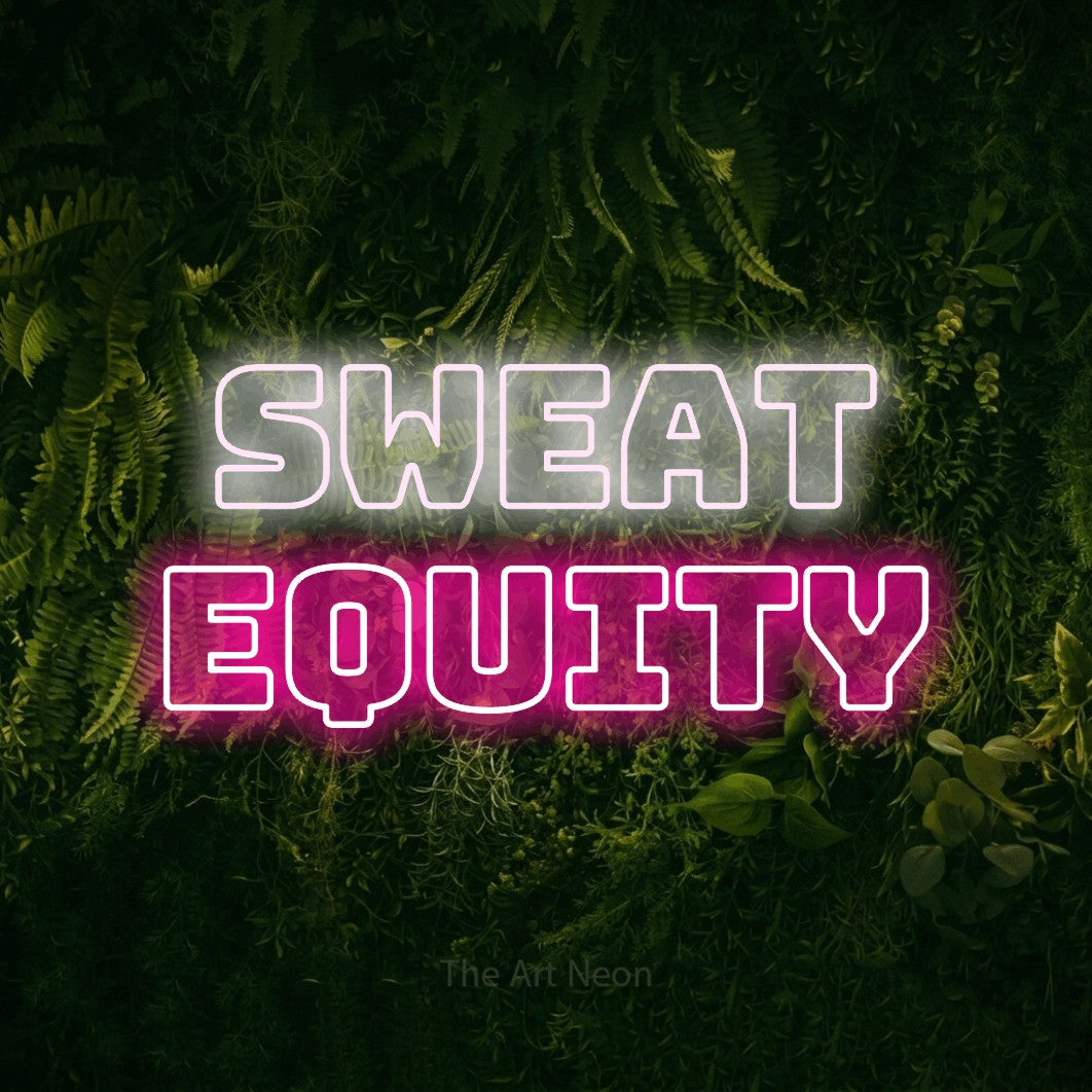Hot pink and cool white outline-style LED neon sign reading "Sweat Equity" against a moss-covered green wall for gym décor